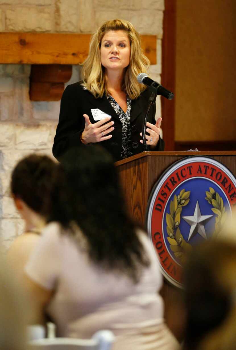 Collin County assistant district attorney Kim Laseter speaks to salon professionals during a...