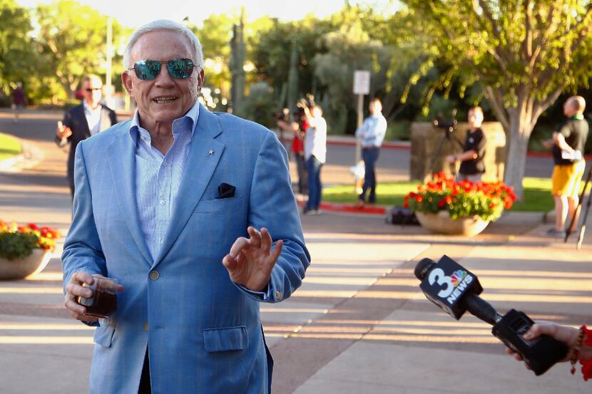 Dallas Cowboys owner Jerry Jones arrives for the opening of the NFL football annual meetings...