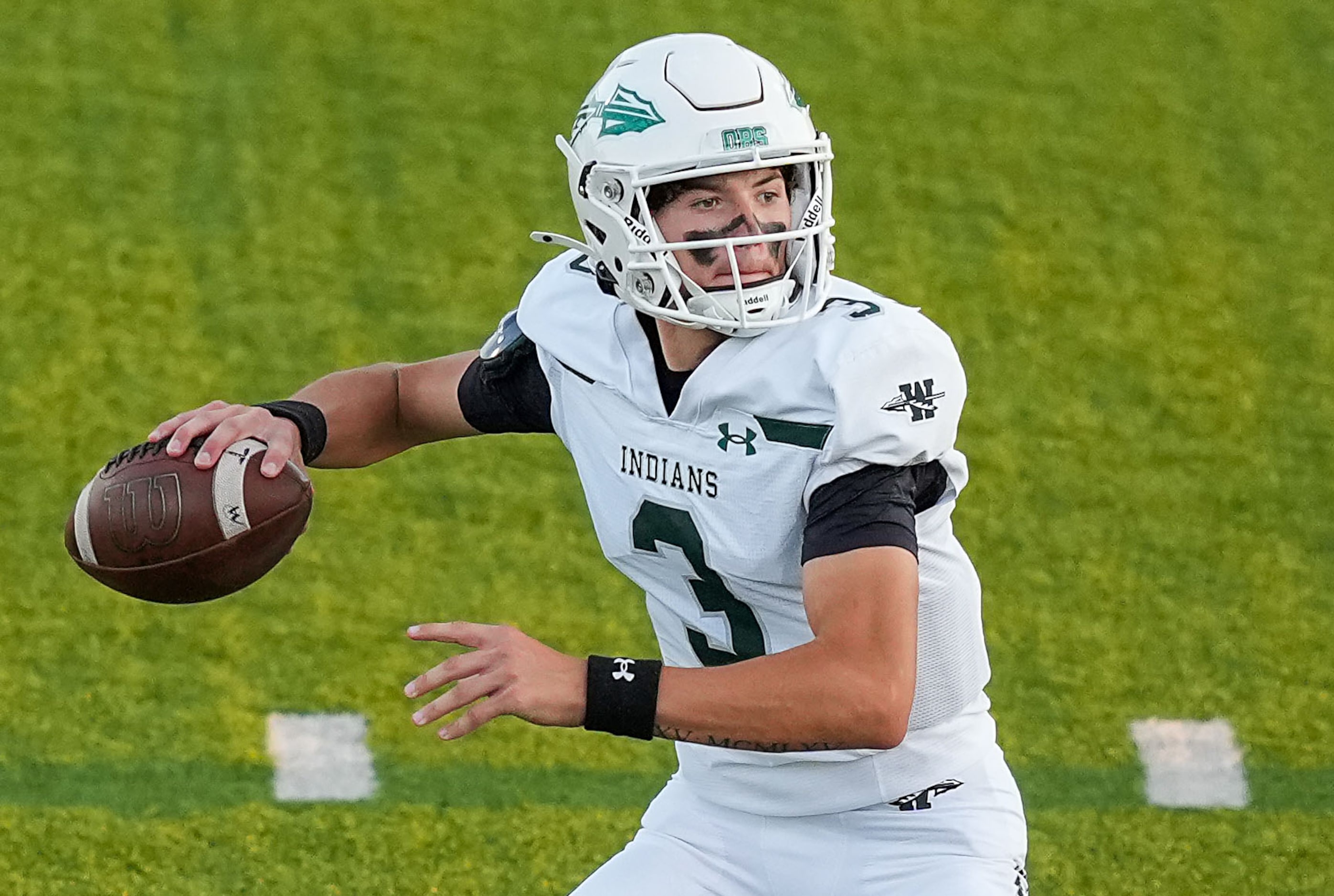 Waxahachie quarterback Jerry Meyer III throws a pass during the first half of a District...