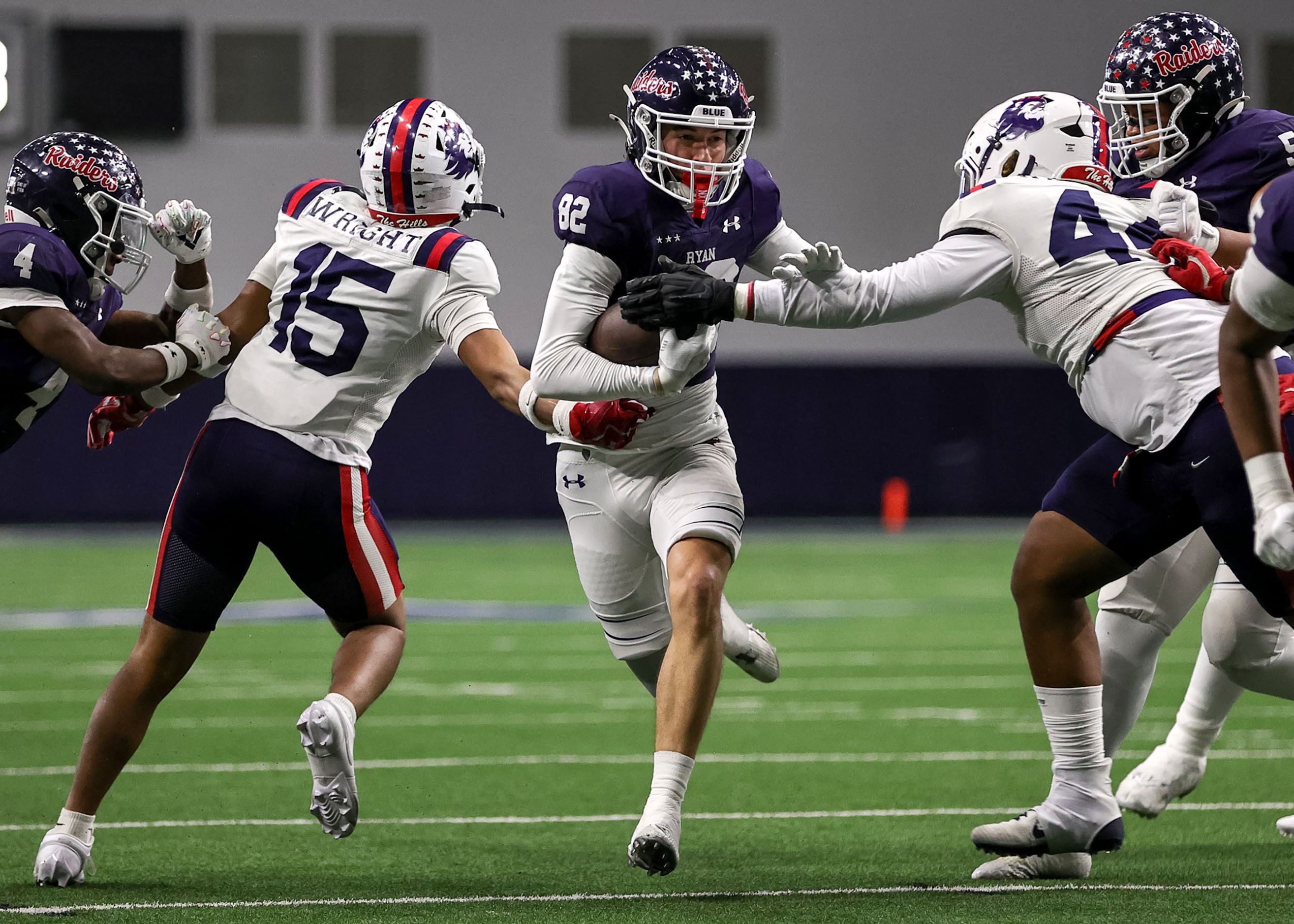 Denton Ryan wide receiver Connelly Cunningham (82) finds a small hole to run against...