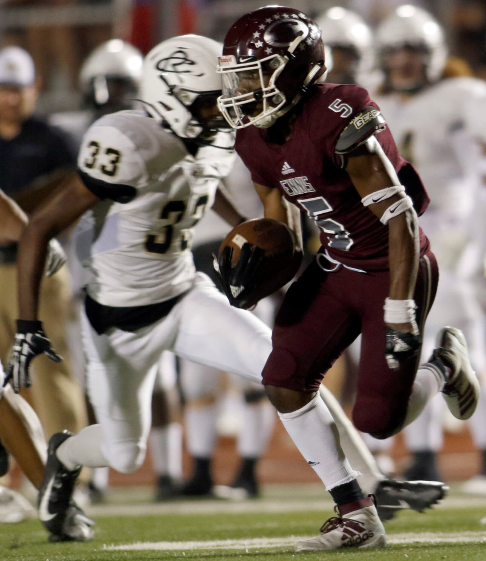 Ennis kickoff returner Stephon Townsend (5) cuts laterally to avoid the defensive pursuit of...