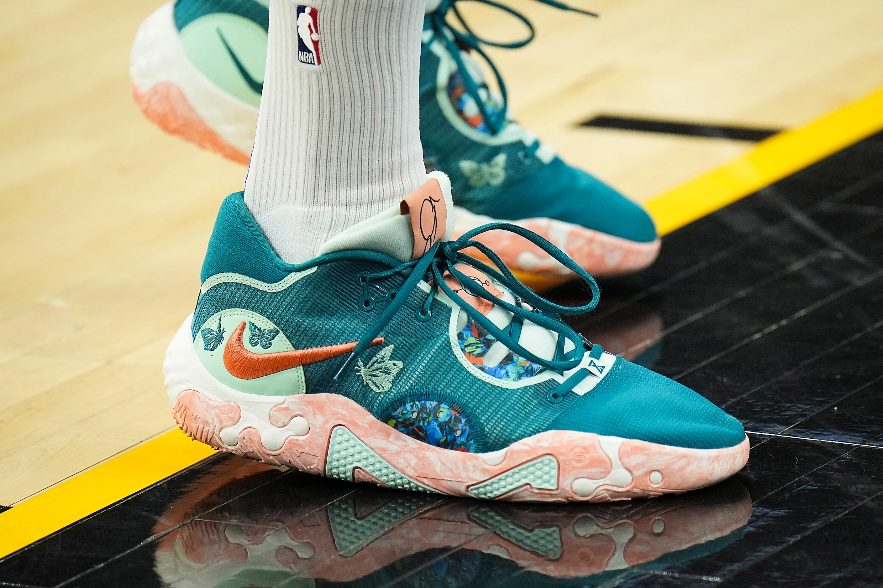 Dallas Mavericks forward Davis Bertans wears Nike PG 6 NRG shoes as the teams warm up before...