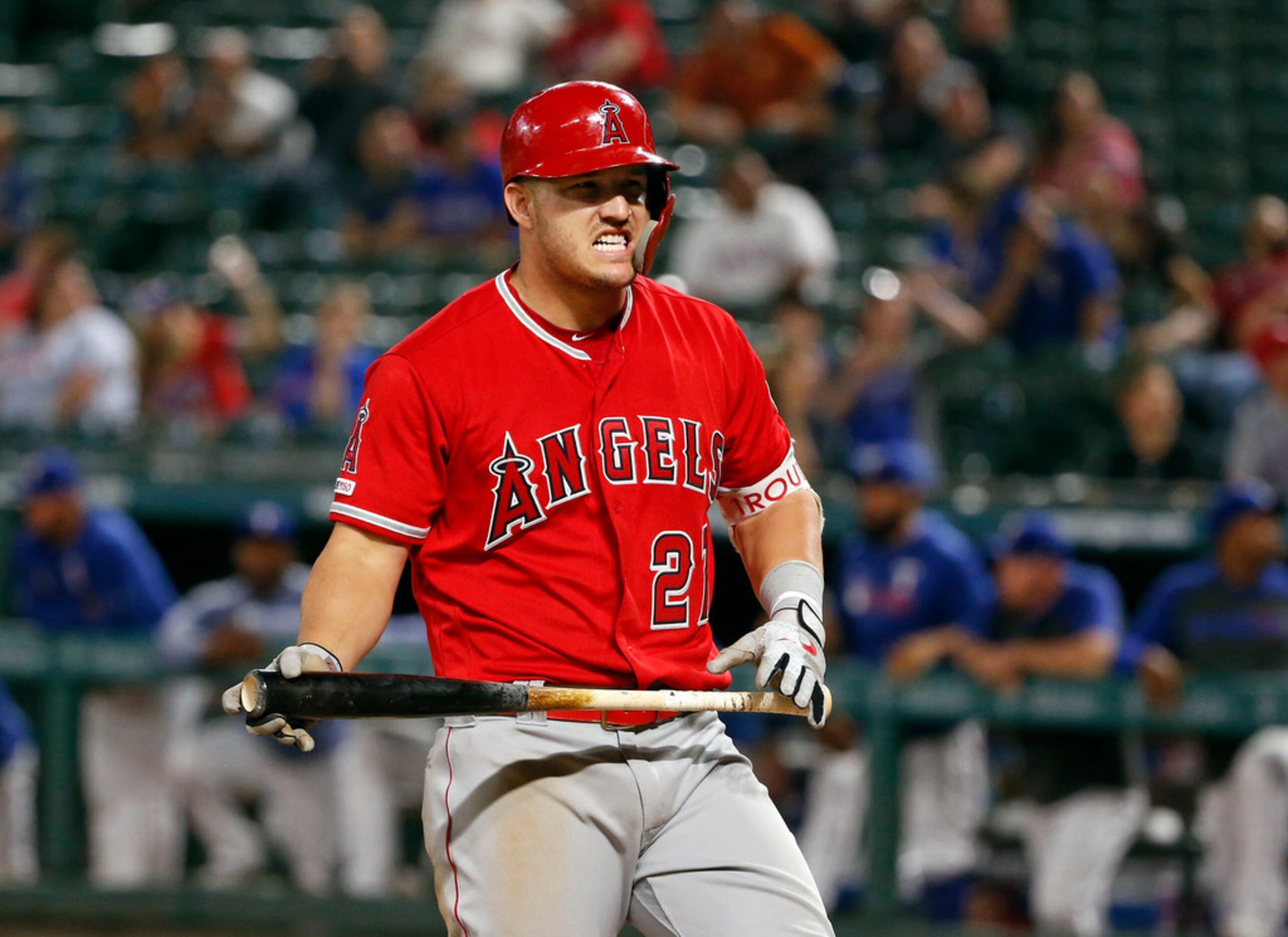 Los Angeles Angels designated hitter Mike Trout reacts after a called strike during the...