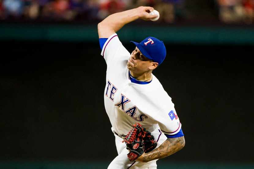 Texas Rangers relief pitcher Keone Kela delivers during the seventh inning against the...