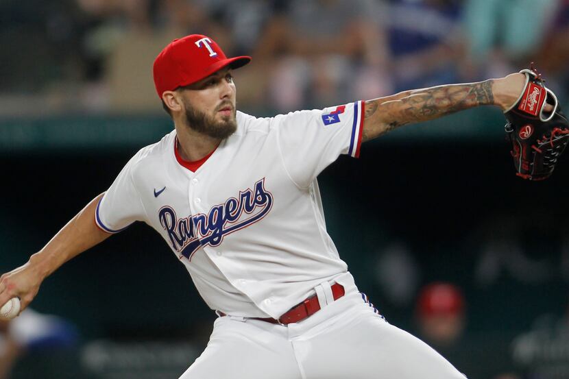 Texas Rangers pitcher Joe Barlow (68) delivers a pitch to a Los Angeles Angels batter during...