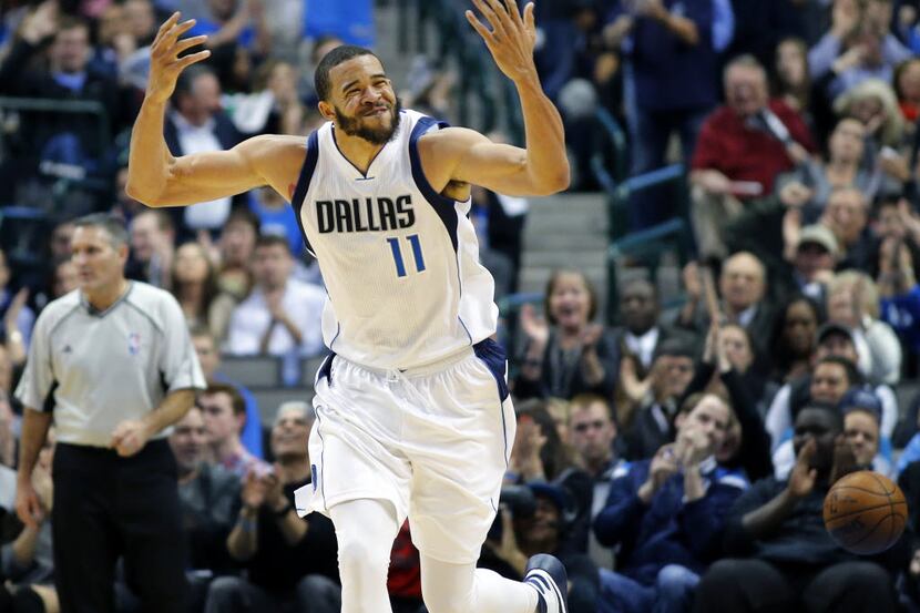 Dallas Mavericks center JaVale McGee (11) gets the crowd in the game after his second half...