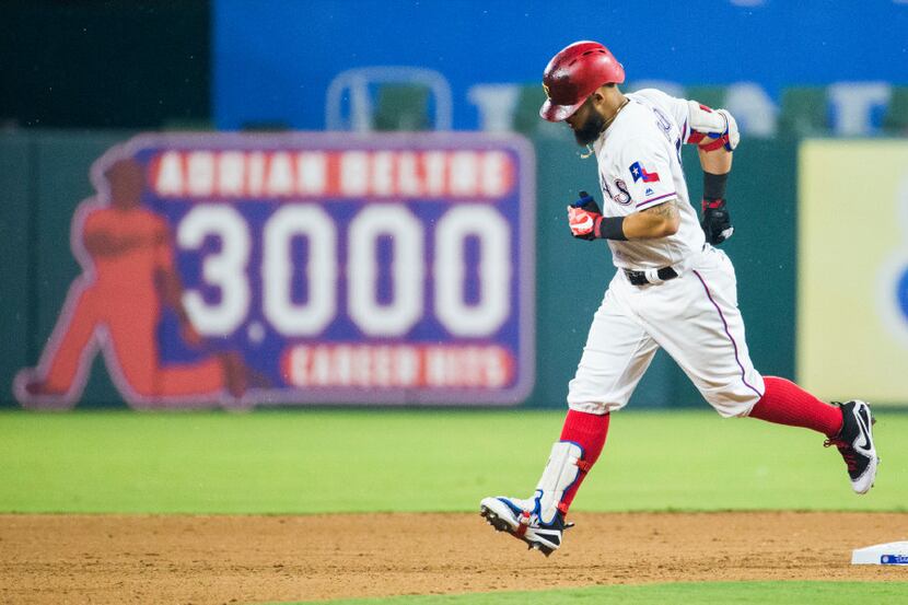 Texas Rangers second baseman Rougned Odor (12) rounds second base after hitting a home run...
