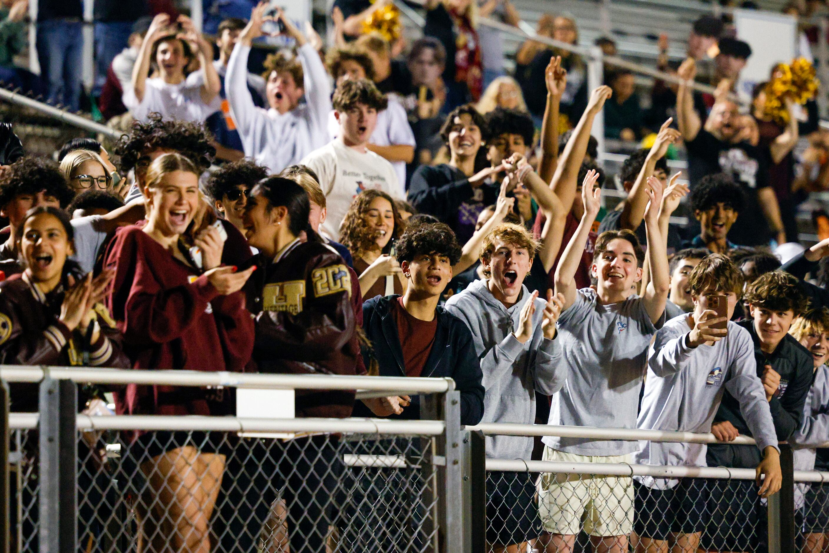 Frisco Heritage students cheer after a goal during the second half of a bi-district playoff...