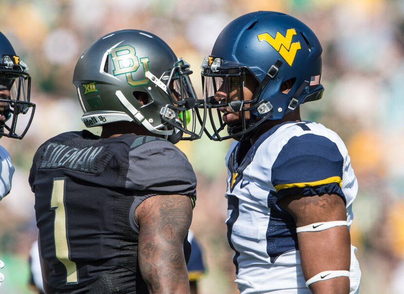 Oct 17, 2015; Waco, TX, USA; Baylor Bears wide receiver Corey Coleman (1) exchanges words...