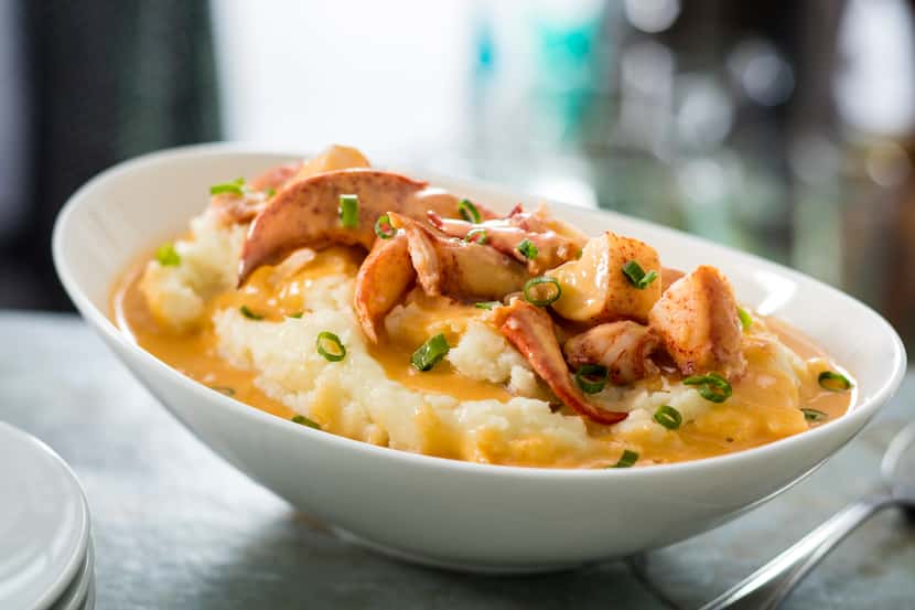 The butter poached lobster with white cheddar mashed potatoes is an indulgent dish at Eddie...