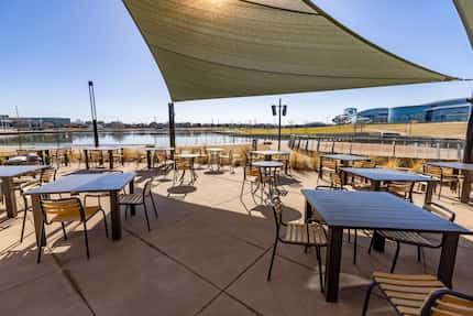 Loop 9 BBQ in Grand Prairie looks out over a man-made lake. The city bought the land in...