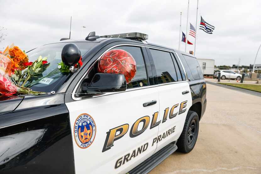Memorial outside of Grand Prairie Police Department on Tuesday, Nov. 15, 2022, for Officer...
