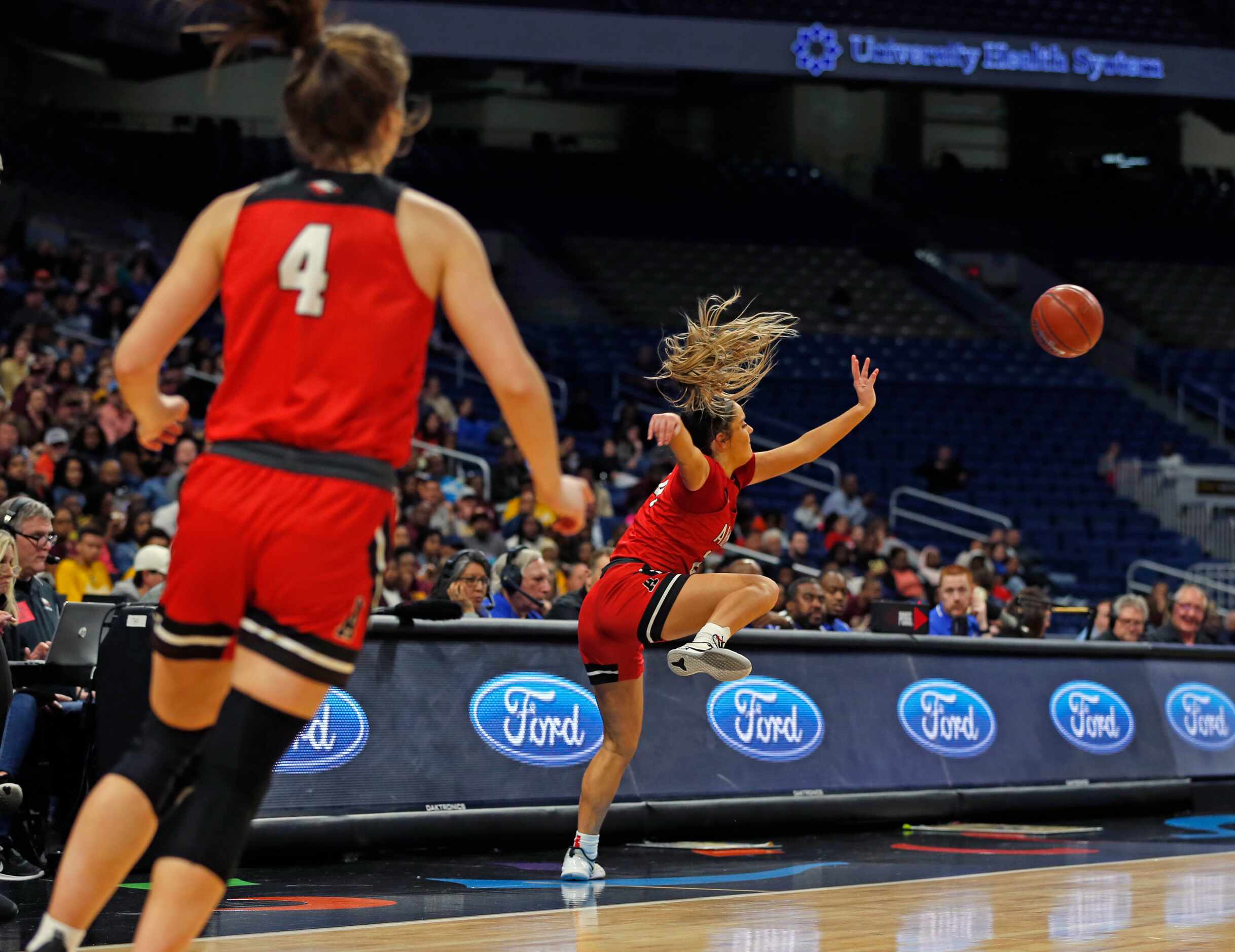 Argyle guard Abby Williams #24 tries to save the ball from going out of bounds in a 4A final...
