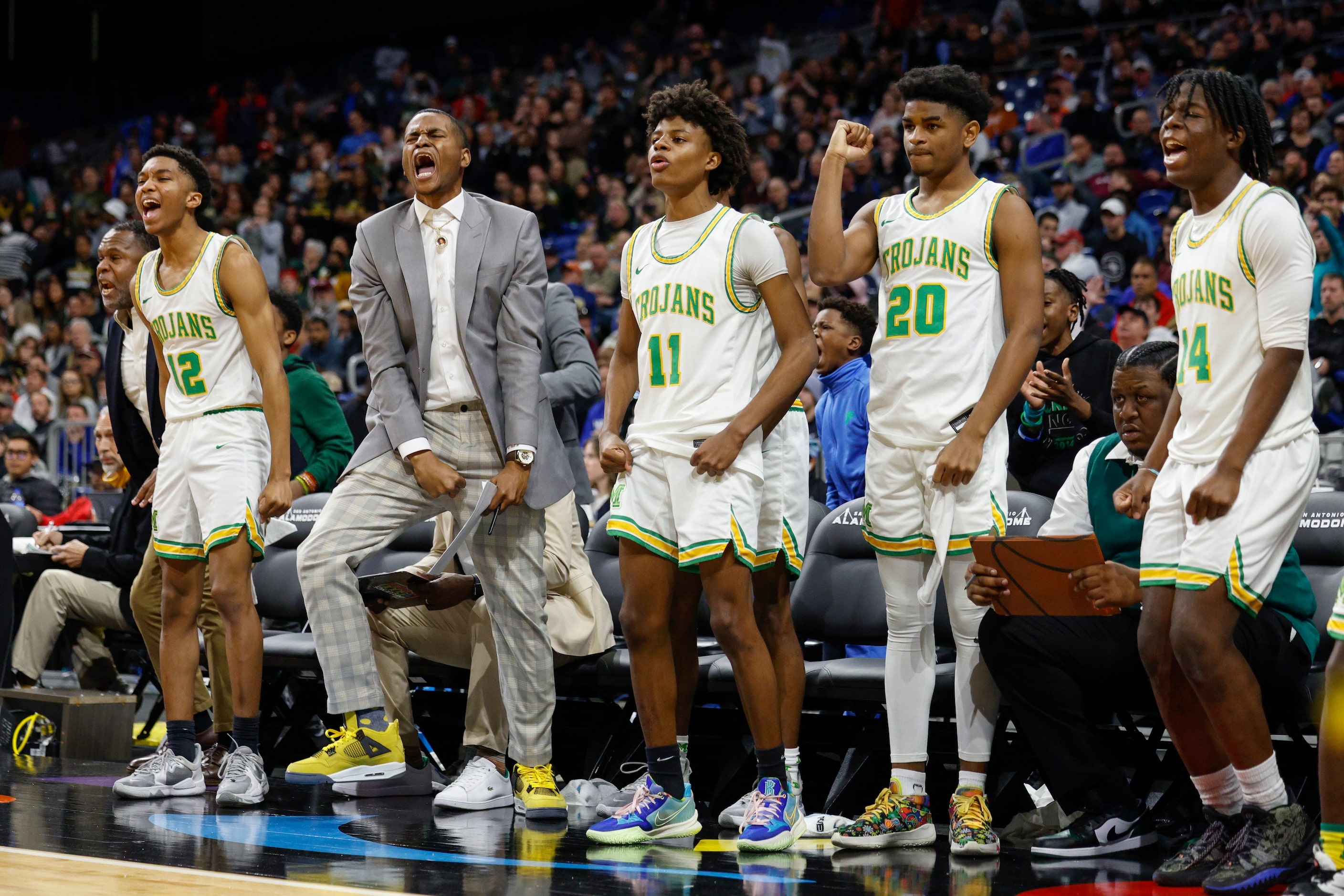 The Madison players celebrate during the fourth quarter of the Class 3A state championship...