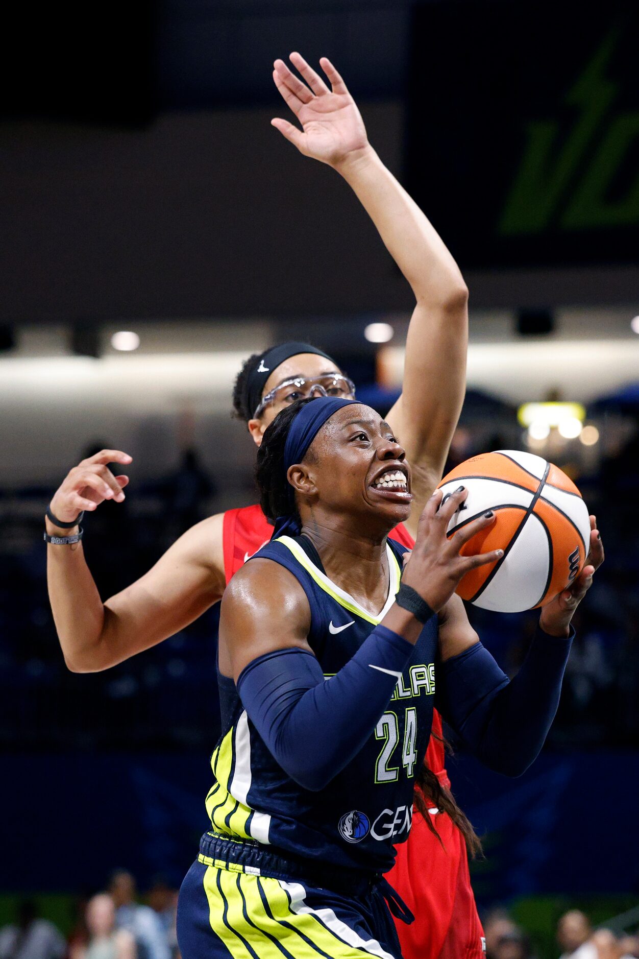 Dallas Wings guard Arike Ogunbowale (24) drives to the basket past Atlanta Dream guard...