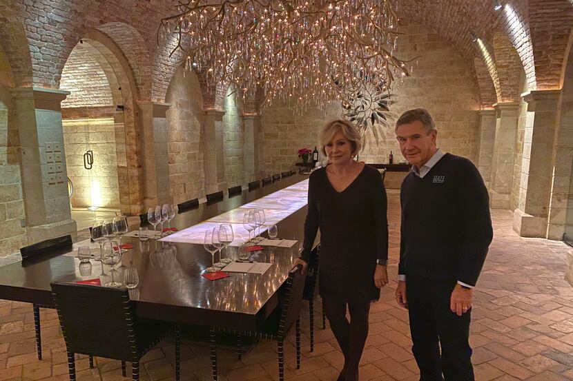 Kathryn and Craig Hall, owners of Hall Rutherford Winery, stand inside the “wine cave”...