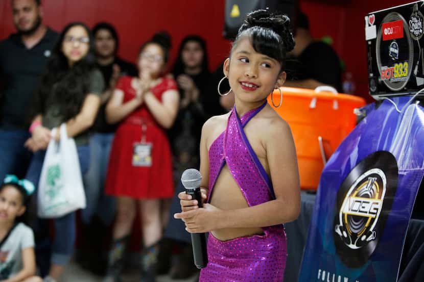 Azlie Garcia, 6, performs during a talent contest at #214Selena: A Tribute to Selena at...