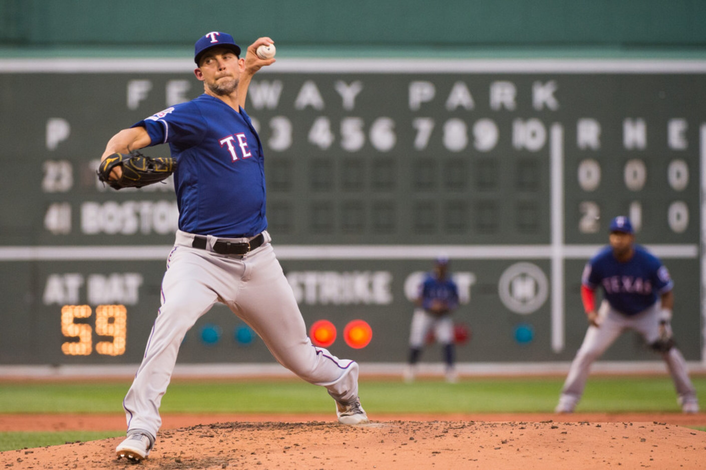 BOSTON, MA - JUNE 10: Mike Minor #23 of the Texas Rangers pitches against the Boston Red Sox...