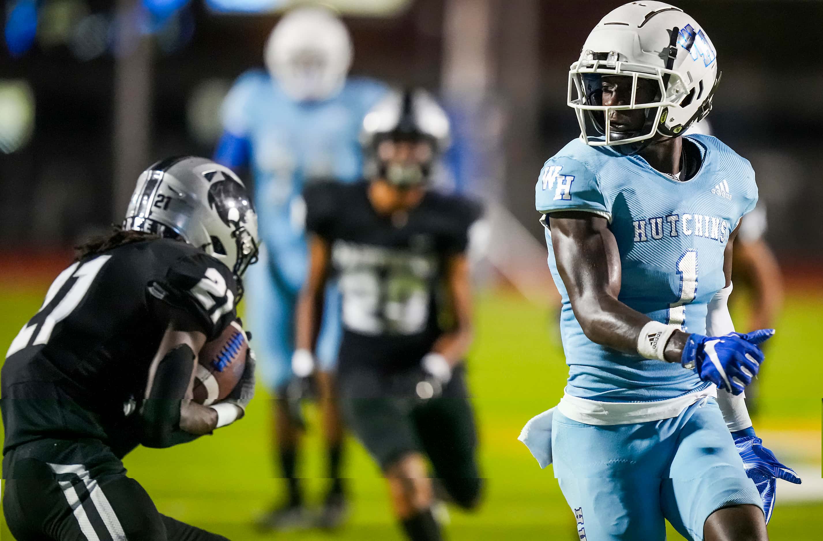 Panther Creek defensive back Donovan Webb (21) intercepts a pass intended for...