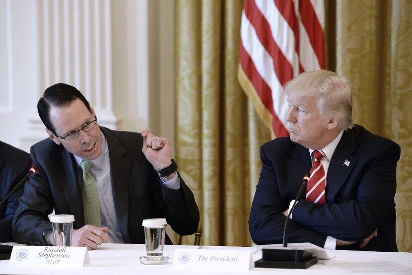 President Donald Trump praised AT&T boss Randall Stephenson for doing "really a top job." 