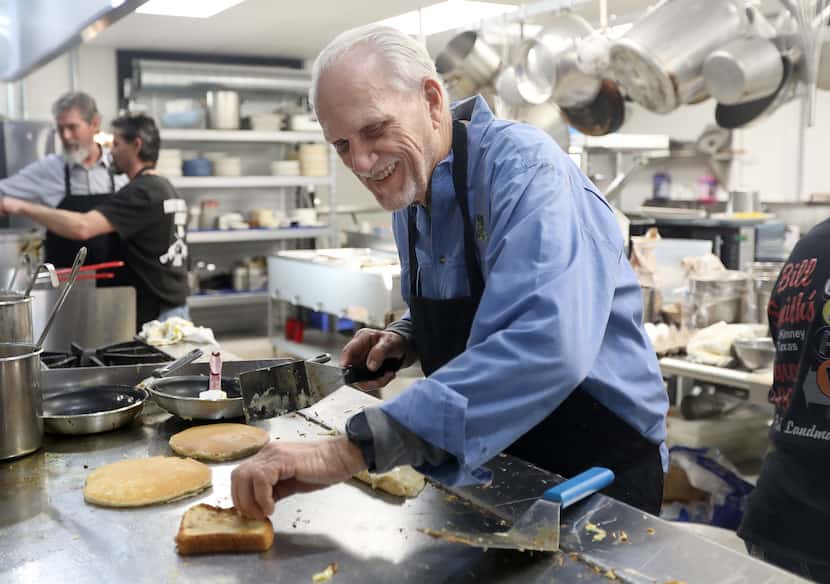 Bill Smith cooks breakfast in the kitchen of the new Bill Smith’s Cafe in Van Alstyne. It...