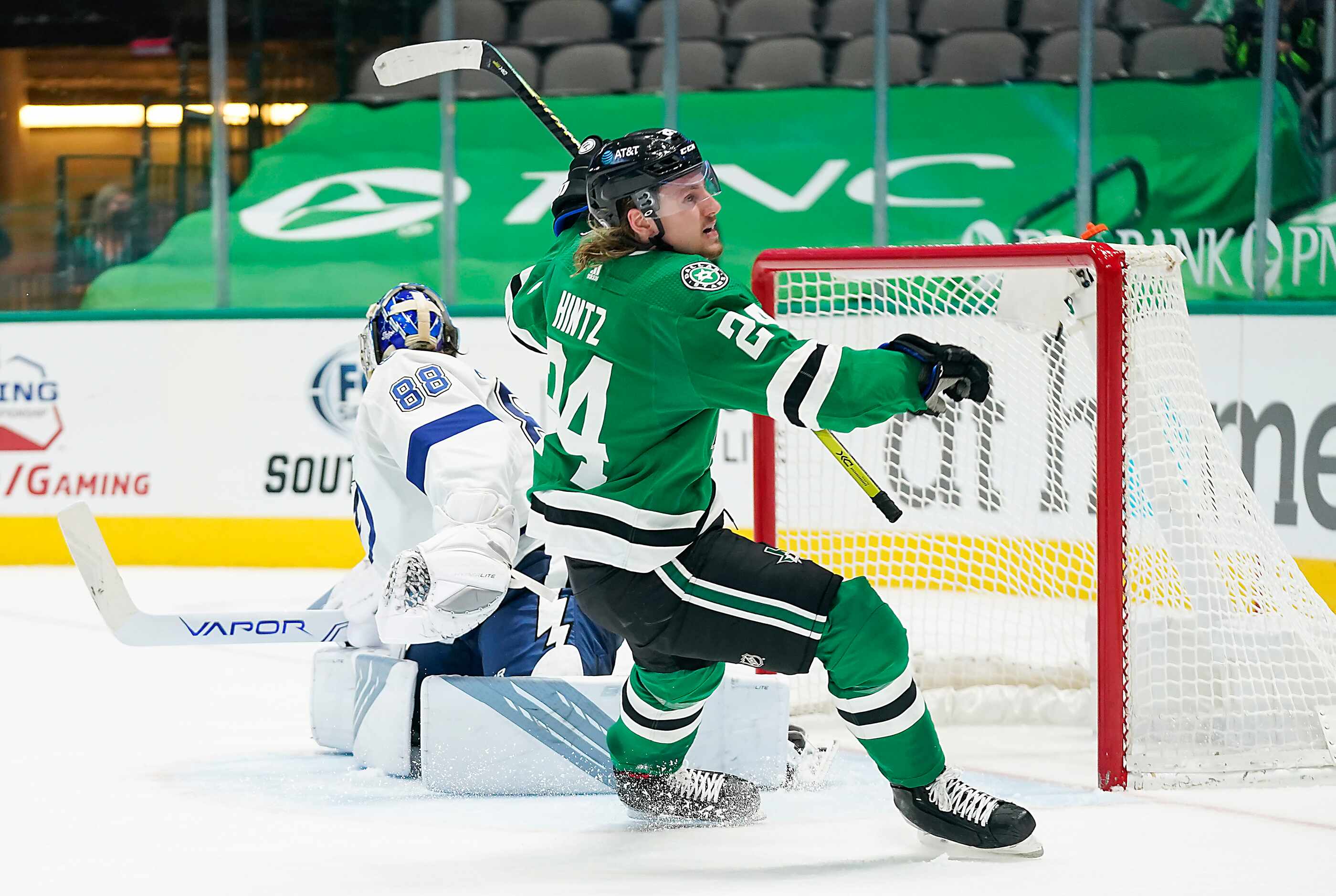 Dallas Stars left wing Roope Hintz (24) celebrates after beating Tampa Bay Lightning...
