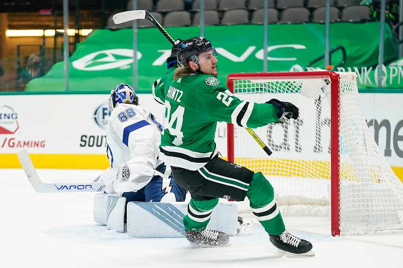 Dallas Stars left wing Roope Hintz (24) celebrates after beating Tampa Bay Lightning...