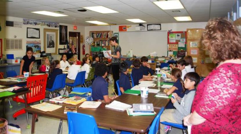 
Stonewall Jackson Principal Michele Hill looks in on a fourth-grade science class on Nov. 5.
