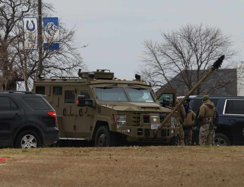 Law enforcement officers outside Colleyville Middle School on Jan. 15, 2022, near the scene...