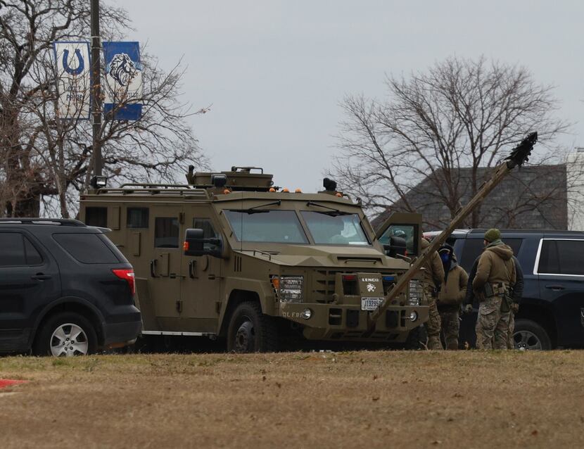 Law enforcement officers outside Colleyville Middle School on Jan. 15, 2022, near the scene...