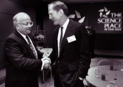  In 1993 Walt Humann, at right, was chair of the Science Place at Fair Park. (Erich...
