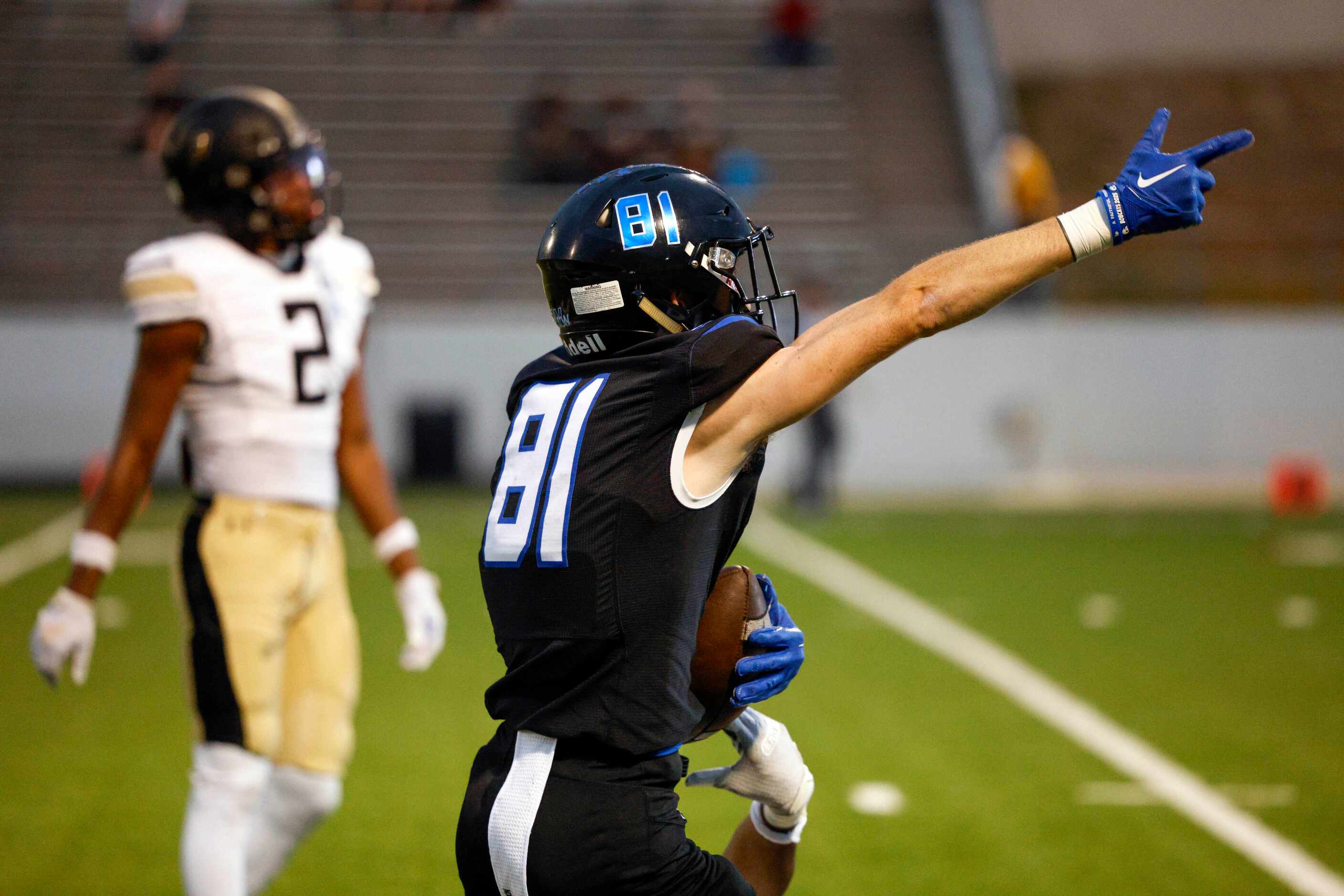 Trophy Club Byron Nelson wide receiver Nicholas Wilson (81) signals for a first down after...