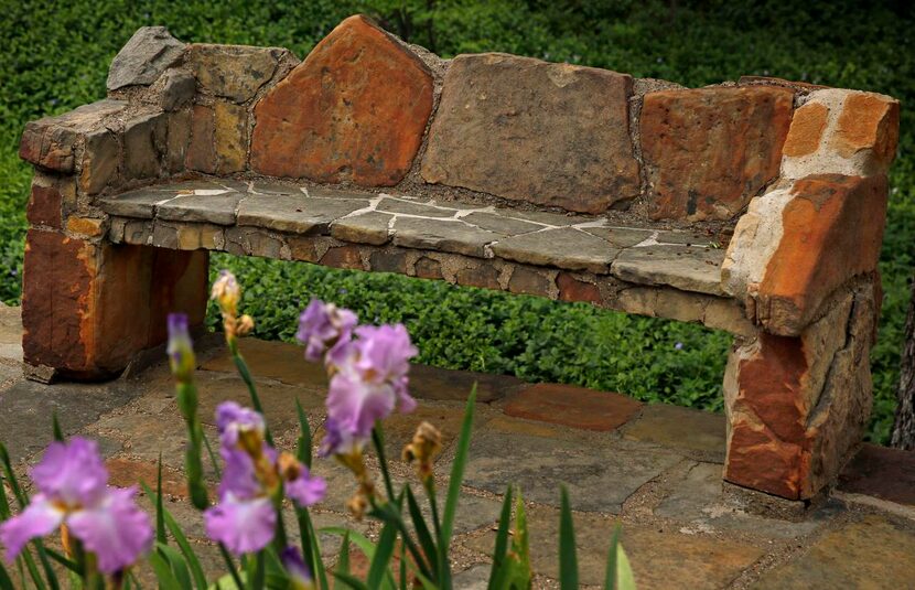 
An original stone bench serves as a reminder of the Works Progress Administration’s many...