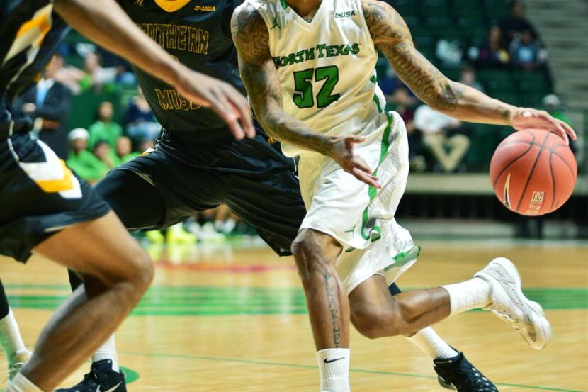 North Texas junior guard J-Mychal Reese (52) drives to the basket against Southern...