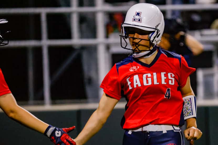 Allen's Sami Hood (4) celebrates running to home during the sixth inning of a District 5-6A...