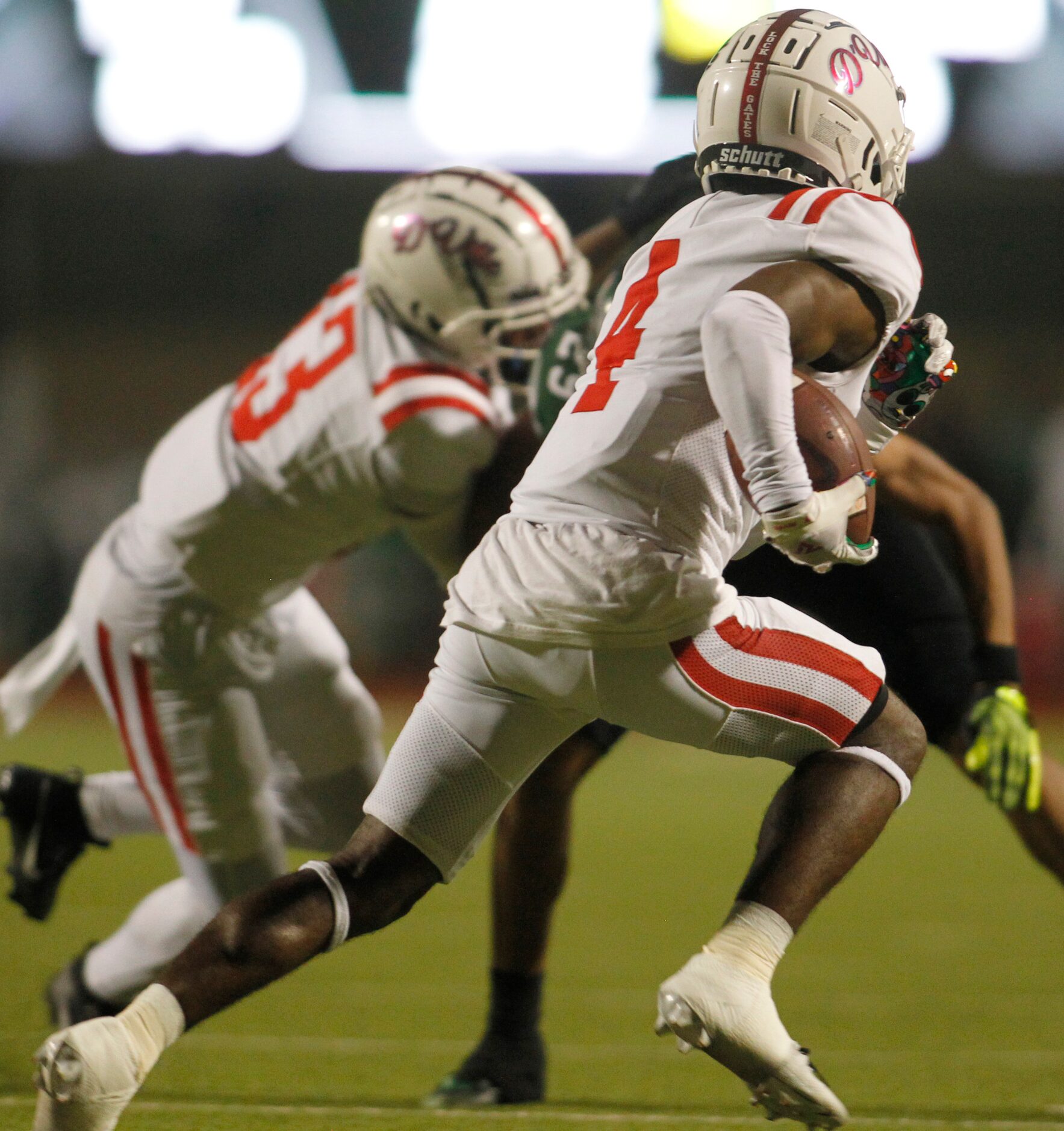 Duncanville receiver Ayson Theus (4) tacks on yardage after a reception during 2nd quarter...