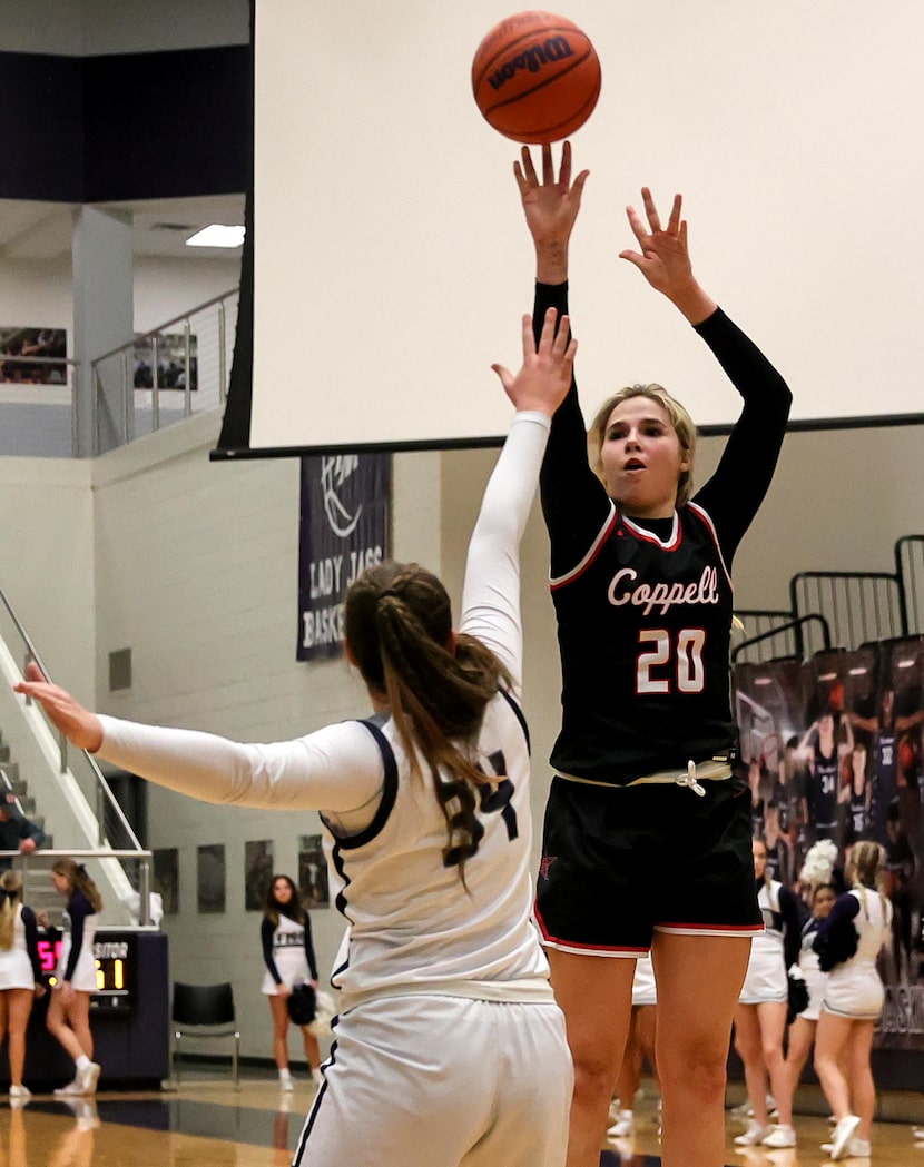 Coppell guard Julianna Lamendola (20) attempts a three point shot against Flower Mound...