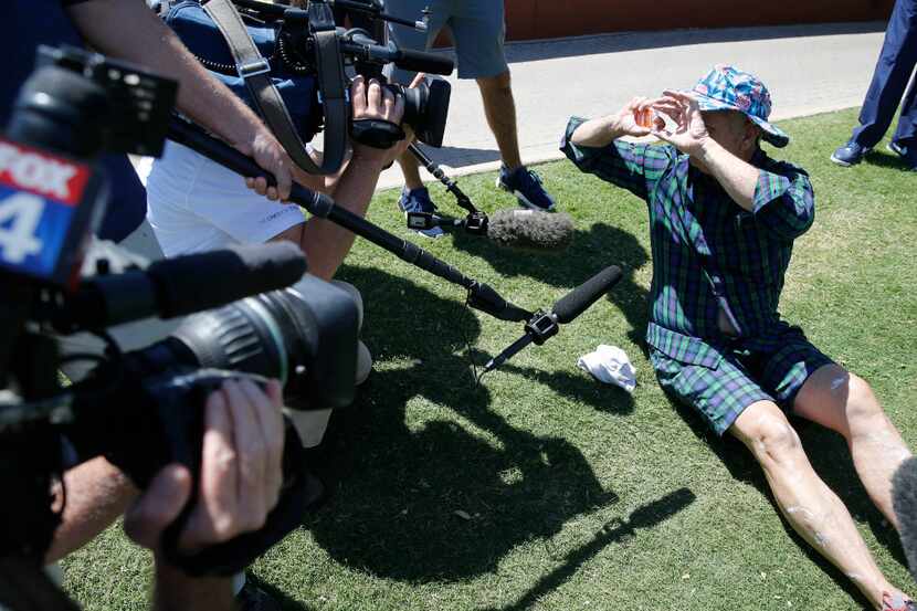 Entertainer Bill Murray pretends to take photos of the media as he prepares to play in the...