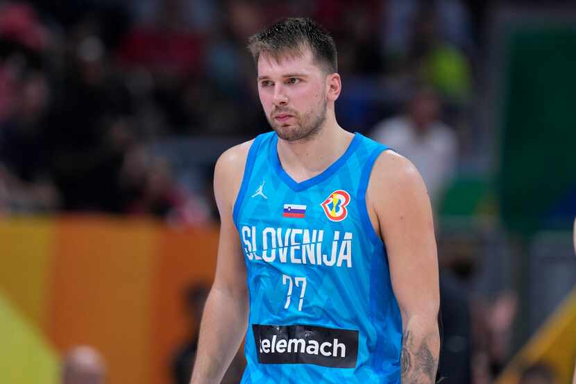 Slovenia's Luka Doncic heads off the court after receiving his second technical foul during...