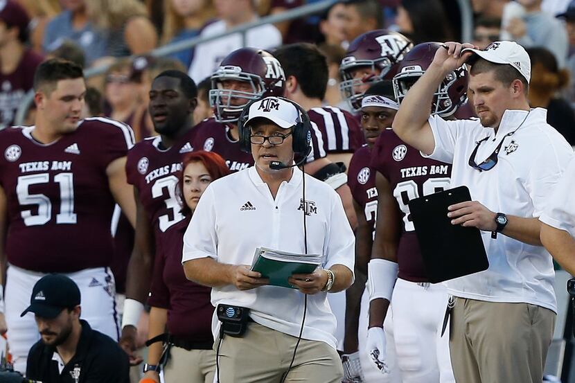 COLLEGE STATION, TX - SEPTEMBER 15:  Head coach Jimbo Fisher of the Texas A&M Aggies  walks...