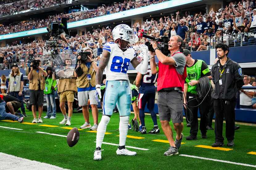 Dallas Cowboys wide receiver CeeDee Lamb celebrates after catching a touchdown during the...