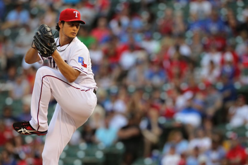 Texas Rangers starting pitcher Yu Darvish (11) throws against the Chicago White Sox in the...