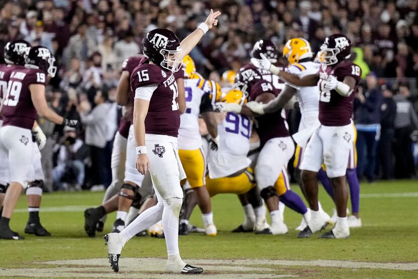 Texas A&M quarterback Conner Weigman (15) reacts as times runs out of an upset of LSU in an...