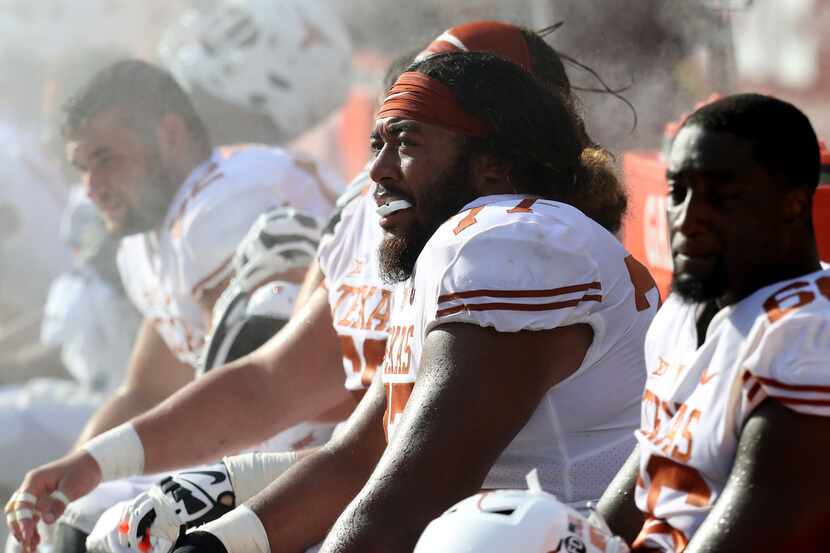 LANDOVER, MD - SEPTEMBER 1: Patrick Vahe #77 of the Texas Longhorns sits on the bench in the...