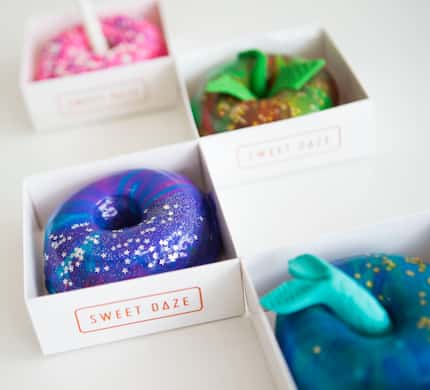 Sweet Daze's doughnuts are often bright in color and dusted with glitter.