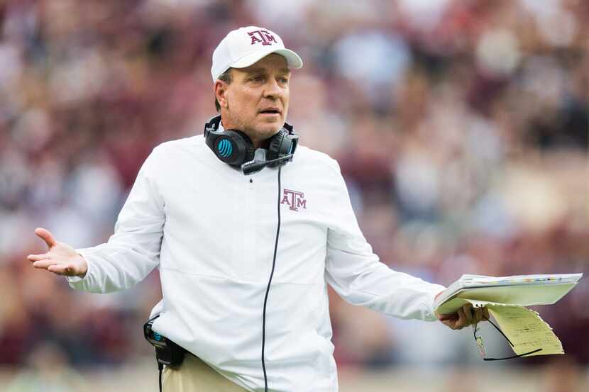 Texas A&M Aggies head coach Jimbo Fisher disputes a call during the first quarter of a...