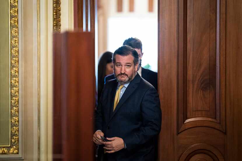 Sen. Ted Cruz, R-Texas, walks out of a meeting room for Donald Trump's lawyers and back to...