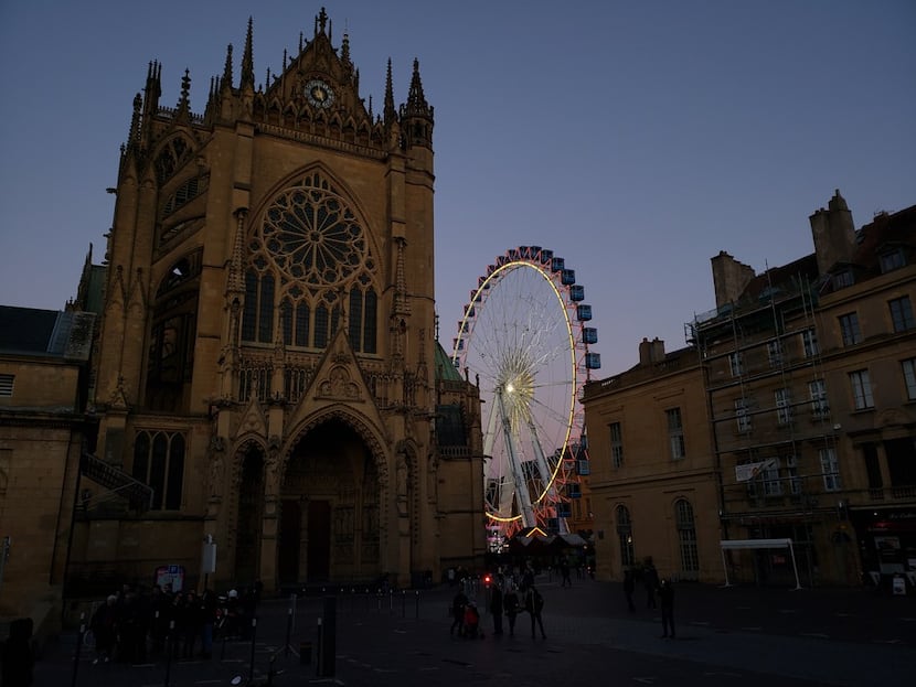 The Ferris wheel at the Christmas market in Metz, France, sits alongside the city's Gothic...