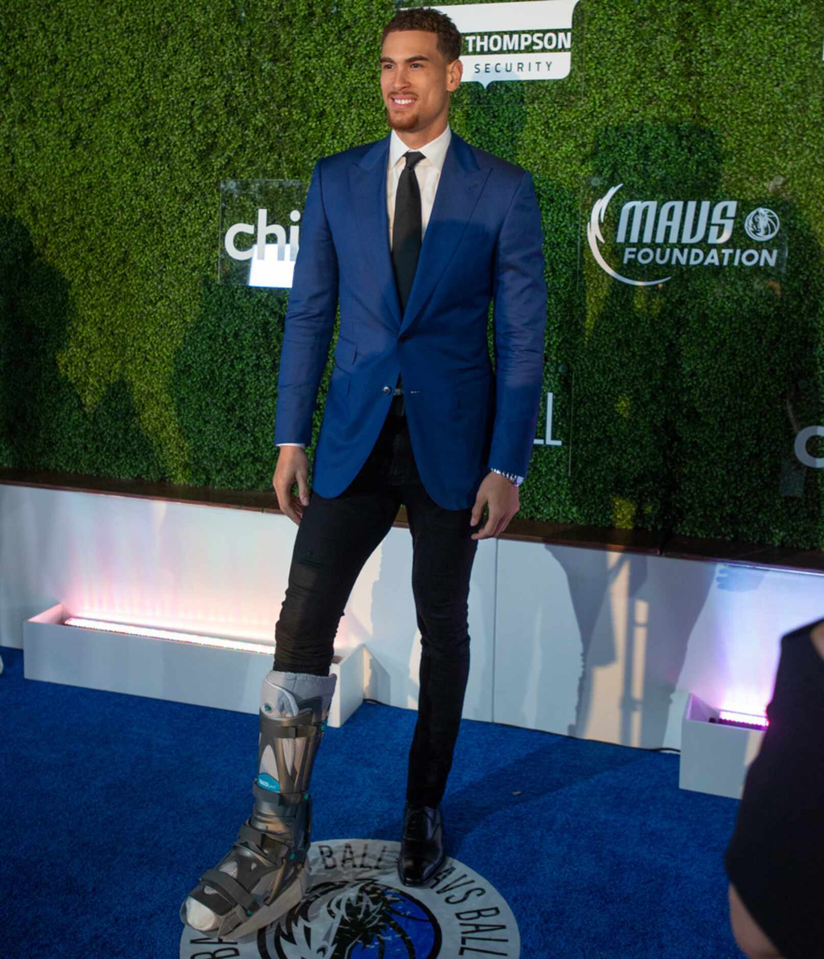 Mavs player Dwight Powell pauses on the blue carpet prior to the Mavs Ball at Million Air in...