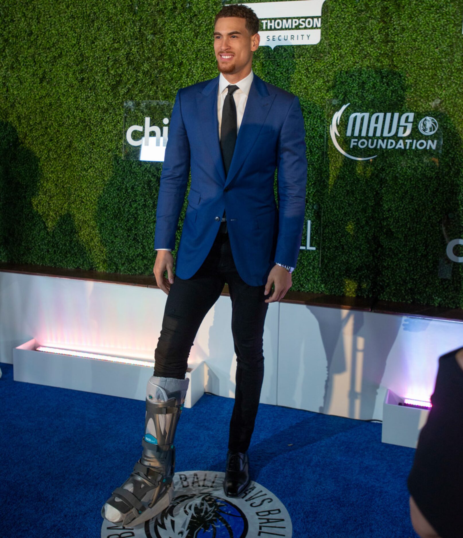 Mavs player Dwight Powell pauses on the blue carpet prior to the Mavs Ball at Million Air in...